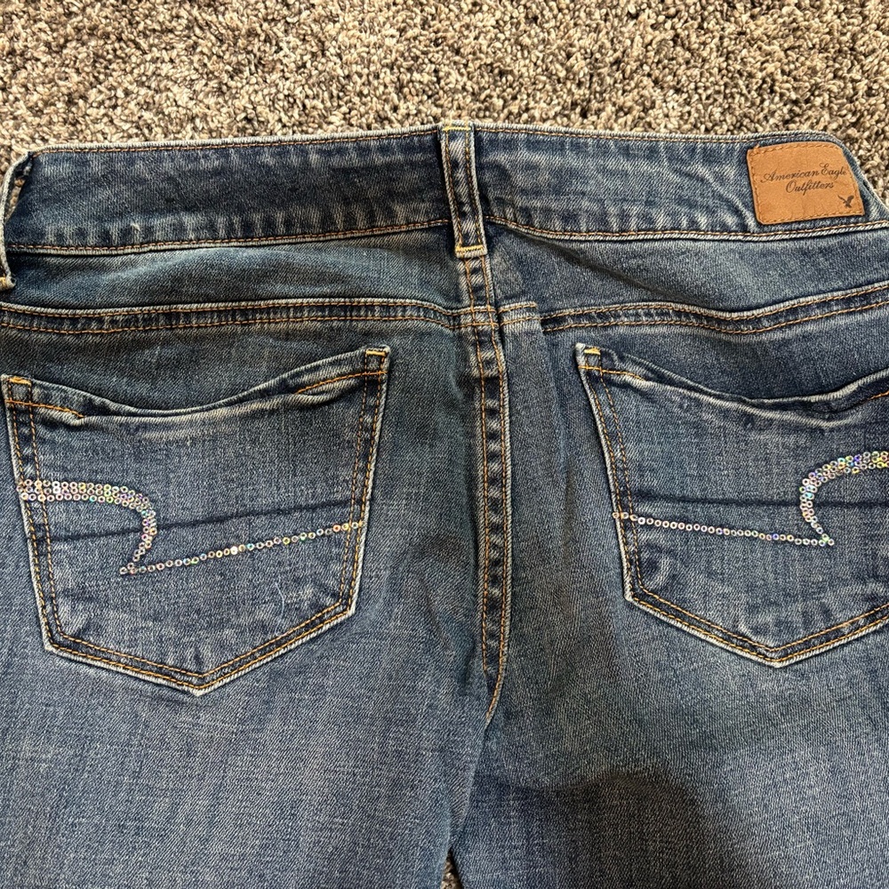 American Eagle Outfitters Women's Boot Cut Jeans with Embellished Pockets